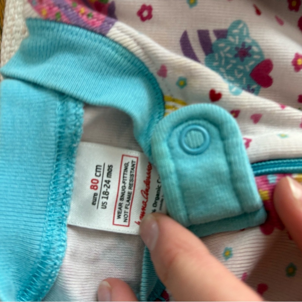 Colorful Baby Onesie with Heart and Flower Design